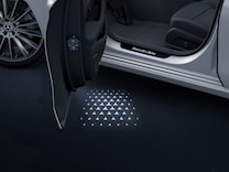 GLS Oświetlenie przestrzenne z animowaną projekcją wzoru Mercedes-Benz z przodu