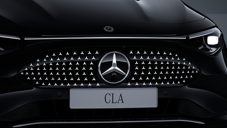 Mercedes Stern teilbeleuchtet Bild 1