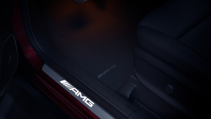 AMG Einstiegsleisten mit "AMG" Schriftzug, beleuchtet und mit Wechselcover Bild 1